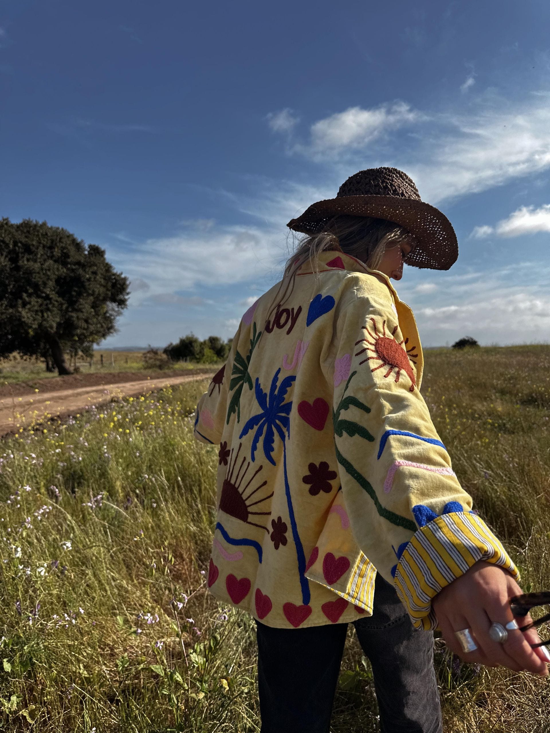 Woman with embroidered jacket